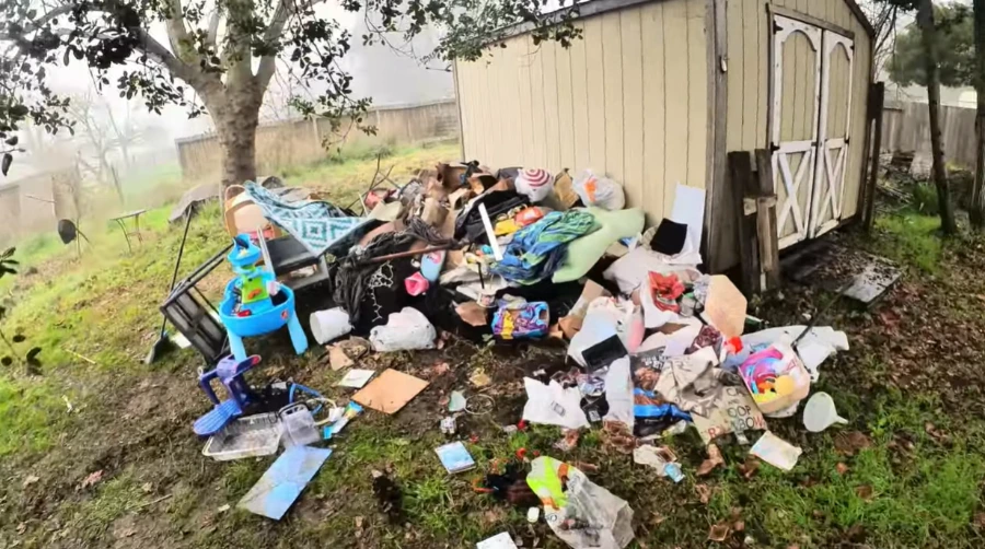 Cluttered Audie Murphy Ranch garage before junk removal
