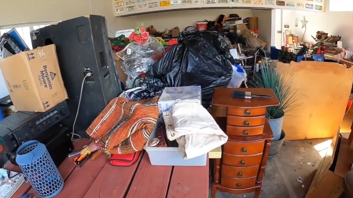 Cluttered room before an estate cleanout in Menifee